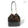 woody Mia Damen-Beuteltasche aus Fell Natur-Schwarz, Rueckansicht