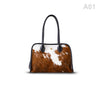 woody Frida Damen-Handtasche aus Natur-Fell in Schwarz mit Lederhenkel