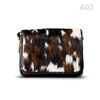 woody Klara Damen-Handtasche aus Natur-Fell in Schwarz-Braun, Variante A02