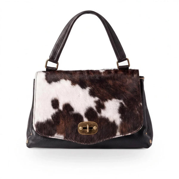 woody Alma - elegante Handtasche in Fell Natur-Schwarz, handgemacht in Österreich