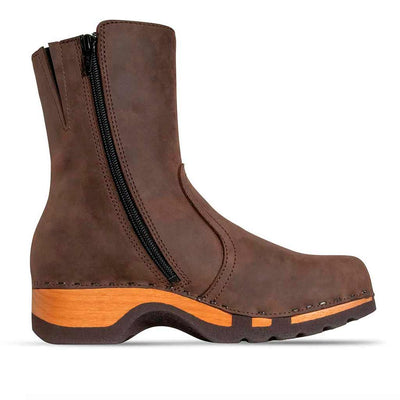 clogs damen veronika woody holzschuhe. veronika ankle boots mit zip, damenstiefel reissverschluss, stiefel, damenclogs mit flexibler, biegsamer holzsohle. holzclogs, clogs damen knöchel stiefel, damen clogs mit fussbett. ankleboots holz schuhe, holzclog, holzschuhe bestellen.